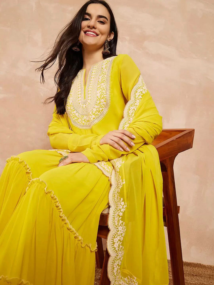 "Zoomed-in shot of cutwork border and sequin embellishments on dupatta"