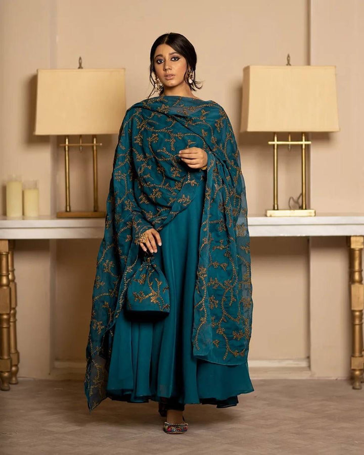 TRADITIONAL ANARKALI PAIRED WITH A BEATUTIFULL EMBROIDERED DUPATTA