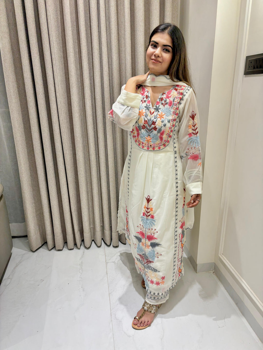 Timeless Full Embroidery Work Kurta Ensemble.